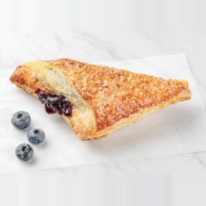 Baked blueberry turnover with sugared puff pastry and blueberry filling