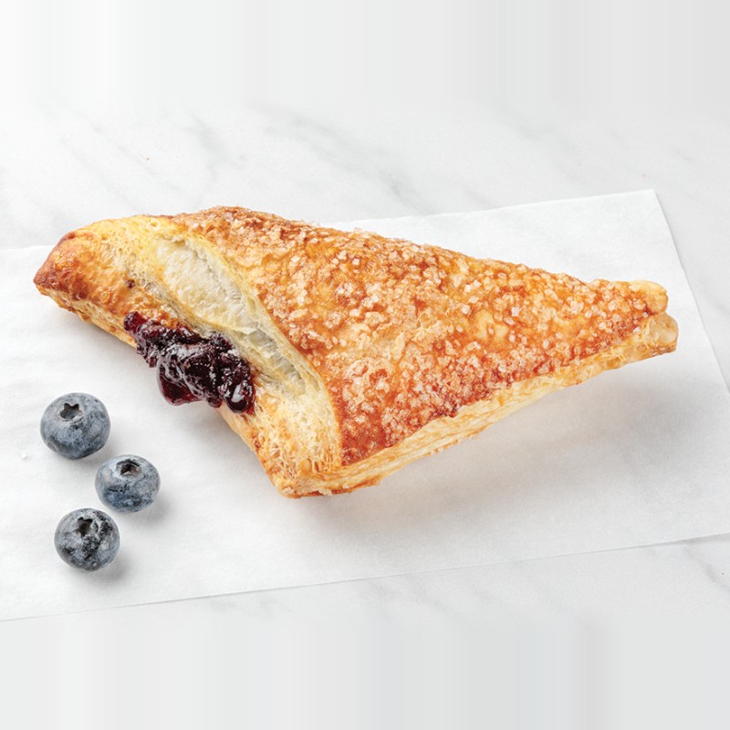 Baked blueberry turnover with sugared puff pastry and blueberry filling